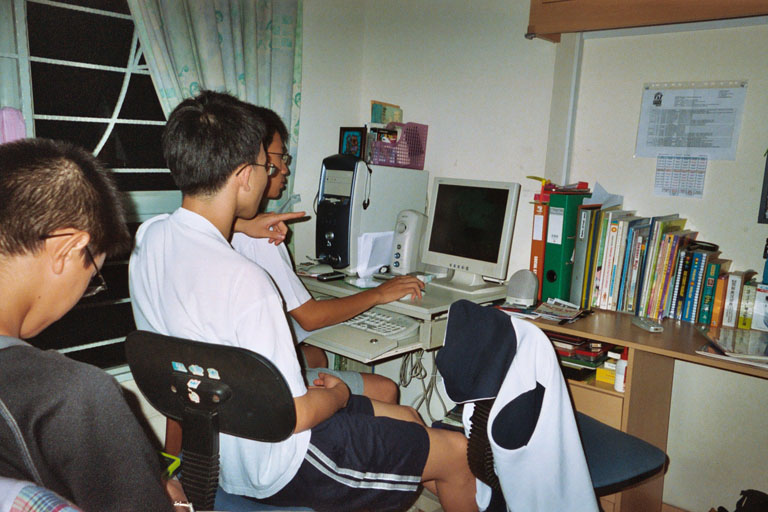 Singapore
My cousins playing a Warcraft III mod on their computer in Singapore

